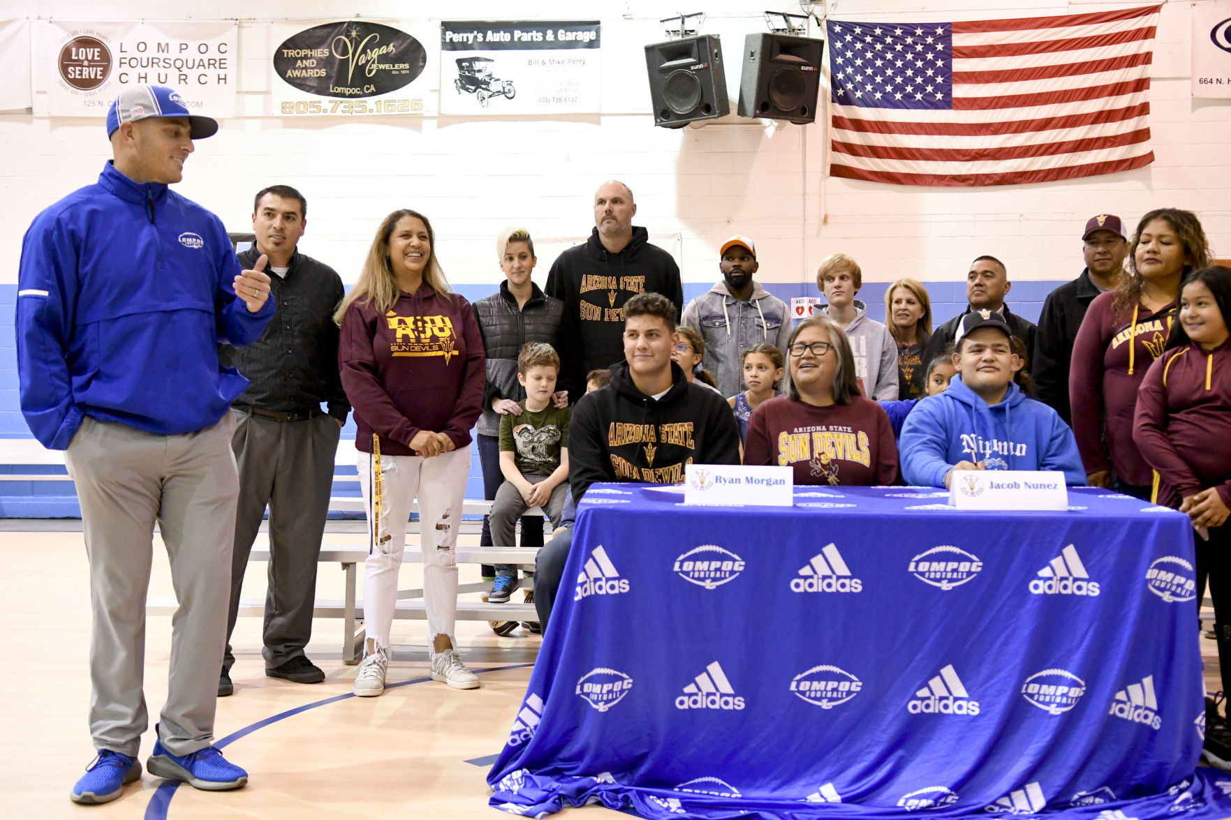 121819 Morgan and Nunez sign 07.jpg